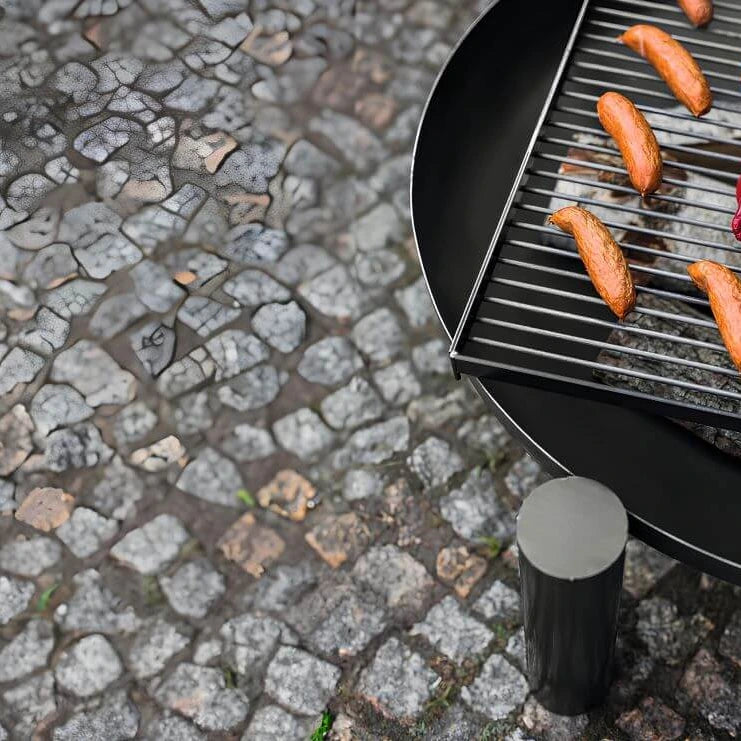 Feuerschale CookKing Palma – Detail des aufgelegten Grillrosts und eines Standbeins