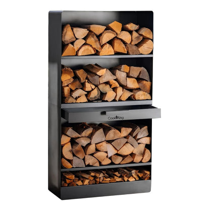 CookKing Kaminholzregal Vento mit Holzscheiten und geöffneter mittiger Schublade auf Weiß