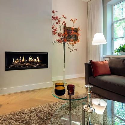 Elektrokamin Kalfire E-one 100F – Elektrokamin in einer weißen Wand neben einem Sofa